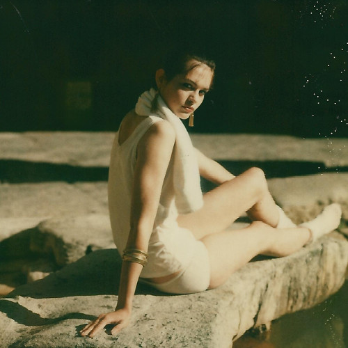 Persephone on diving stone. Photographer: Chris Roberts. Model: Persephone. Hair: Ian (me). Makeup: Arianne. Bath 16:08:1981. Test Session Polaroid.